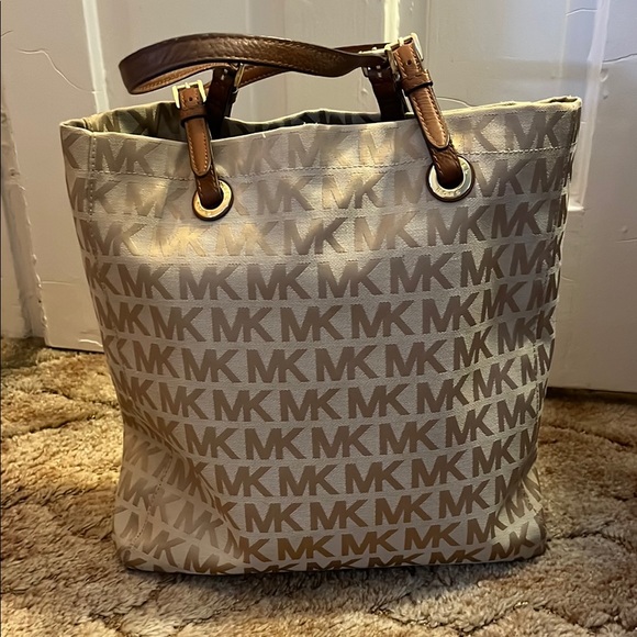 Michael Kors Handbags - Michael Kors Beige Monogram Tote Bag